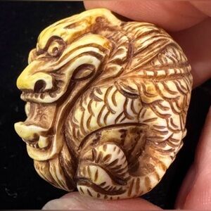 Intricately Carved Faux Ivory Coiled Dragon Netsuke